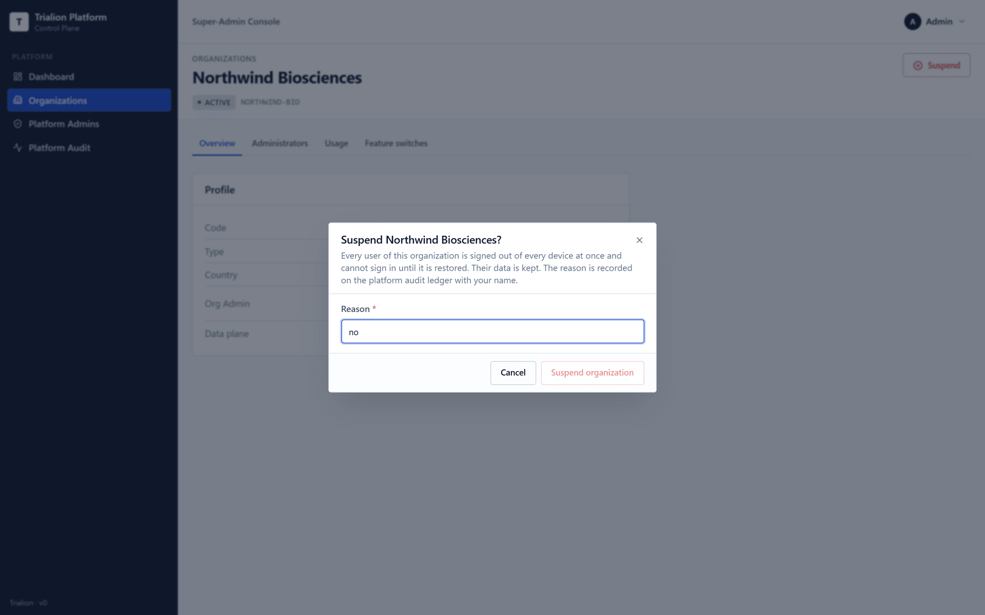 Suspending an organization with a reason shorter than five characters: the dialog refuses it.